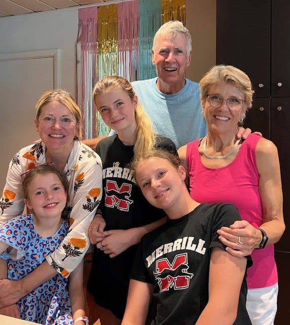 Caroline Fisher, Bob Knous and grandkids pose for the camera